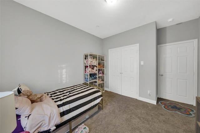 carpeted bedroom with a closet