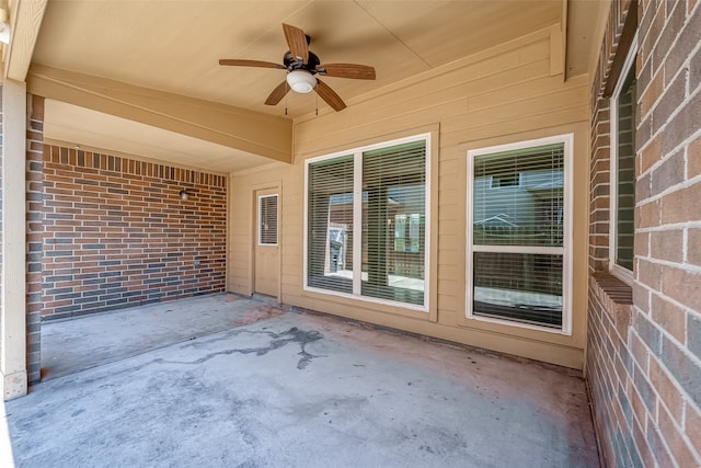 view of patio featuring ceiling fan