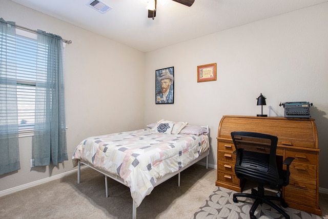 carpeted bedroom featuring ceiling fan