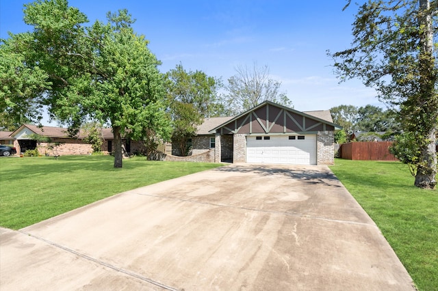 view of front of home featuring a front lawn and a garage