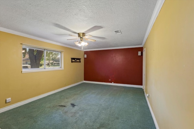 spare room with a textured ceiling, dark carpet, ceiling fan, and ornamental molding