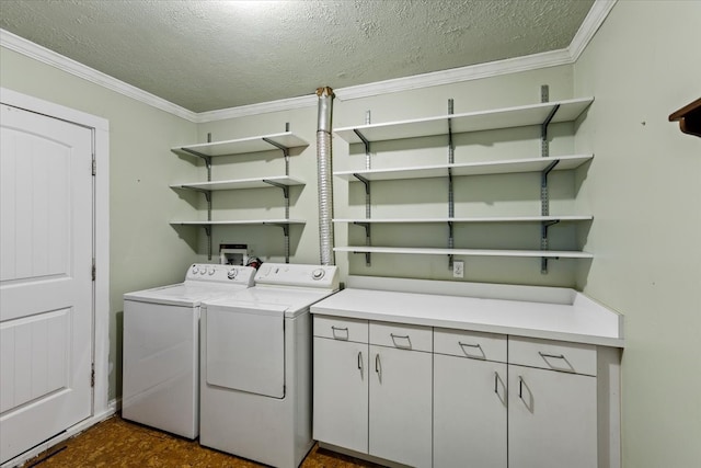 washroom with separate washer and dryer, crown molding, cabinets, and a textured ceiling