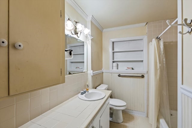 full bathroom with vanity, toilet, built in features, ornamental molding, and shower / tub combo with curtain