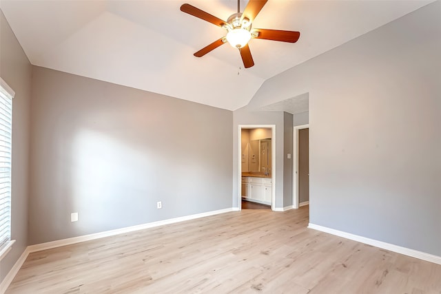 unfurnished room featuring light wood-type flooring, lofted ceiling, and ceiling fan