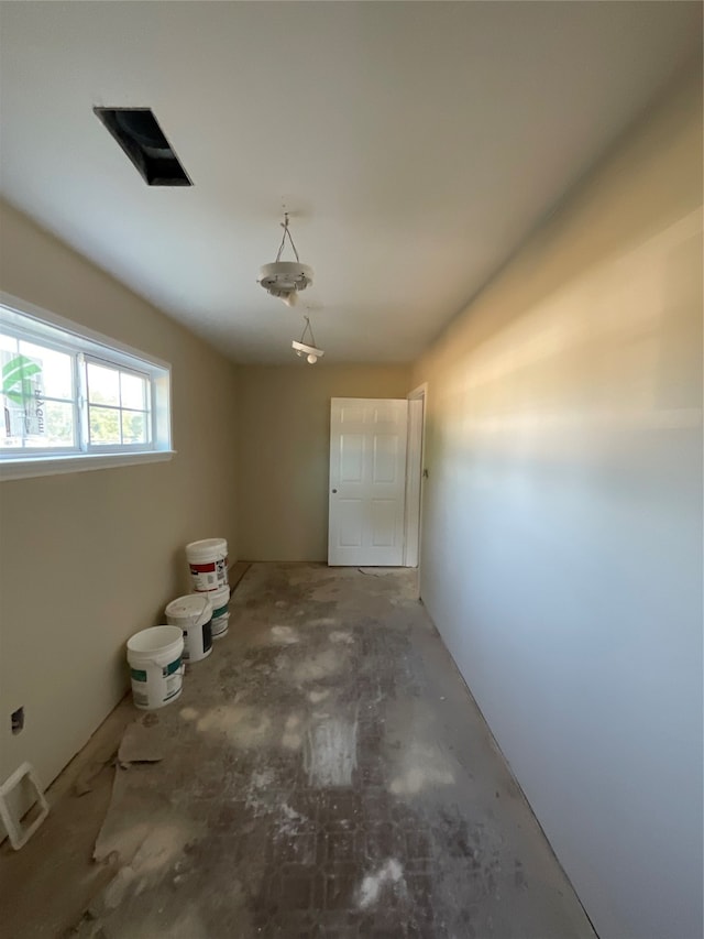 interior space featuring concrete flooring