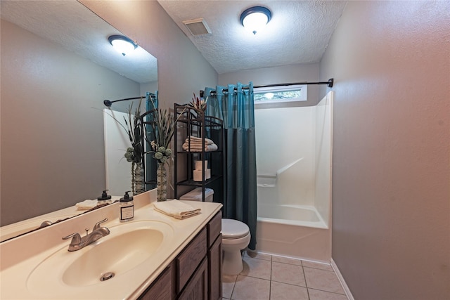 full bathroom with shower / tub combo, tile patterned floors, vanity, a textured ceiling, and toilet