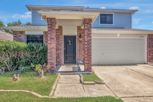 view of front of home with a garage