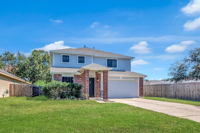 view of property with a garage and a front lawn