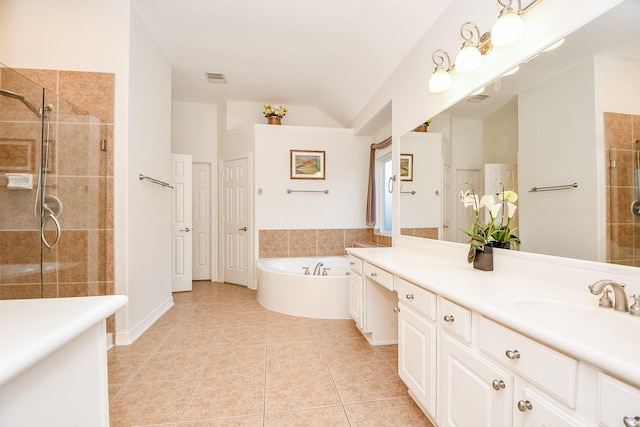 bathroom featuring tile patterned floors, plus walk in shower, vanity, and lofted ceiling