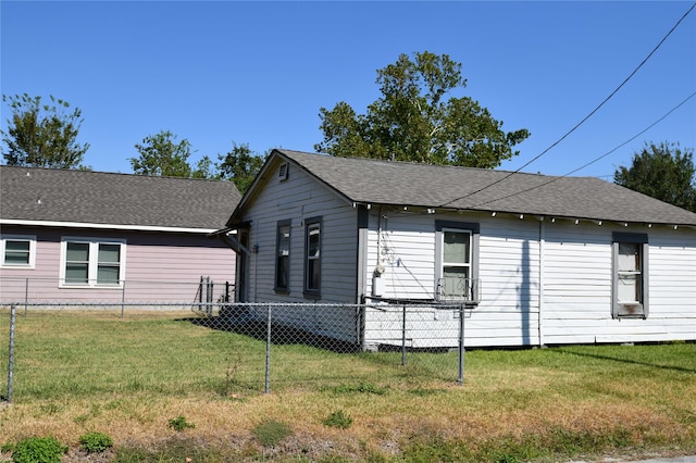 view of home's exterior featuring a lawn