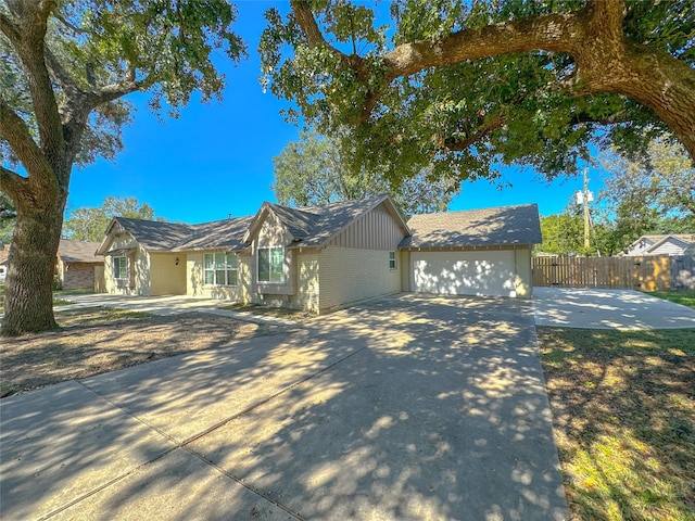 single story home with a garage