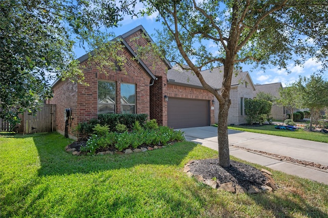 view of front facade featuring a front yard and a garage