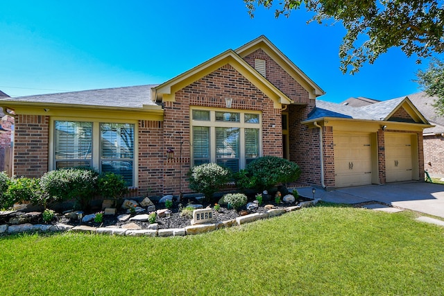 ranch-style home with a garage and a front lawn