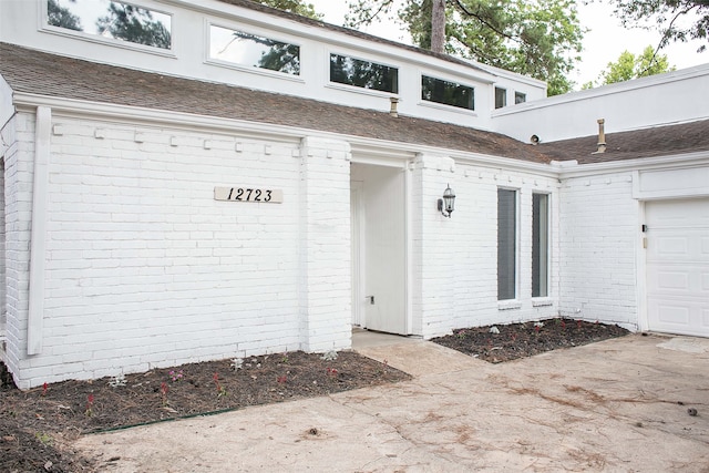 entrance to property with a garage