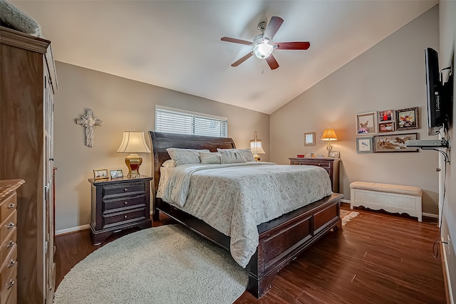 bedroom featuring vaulted ceiling, ceiling fan, and dark wood-type flooring