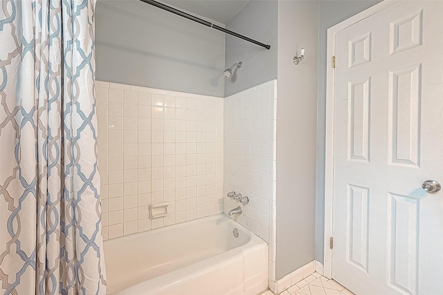 bathroom with shower / bath combination with curtain and tile patterned floors