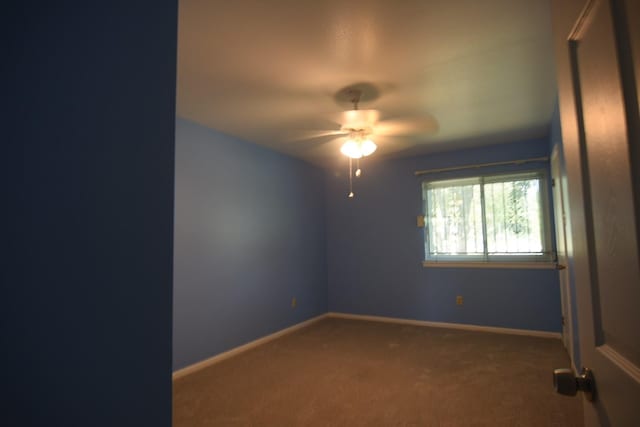 unfurnished room featuring carpet flooring and ceiling fan