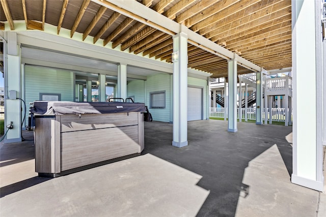 view of patio / terrace featuring a hot tub