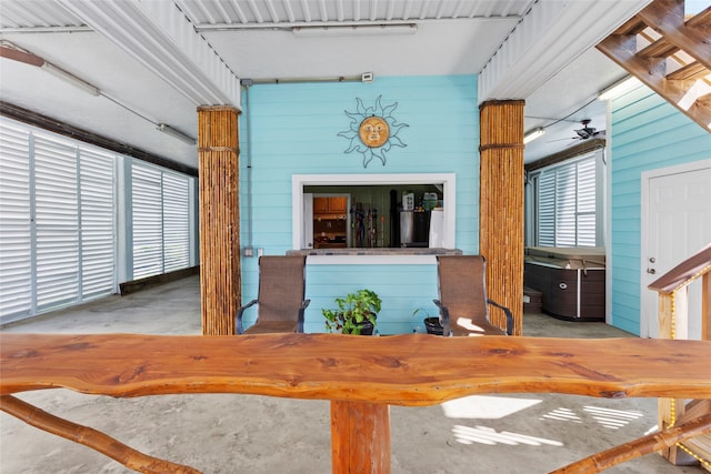 dining room with unfinished concrete floors