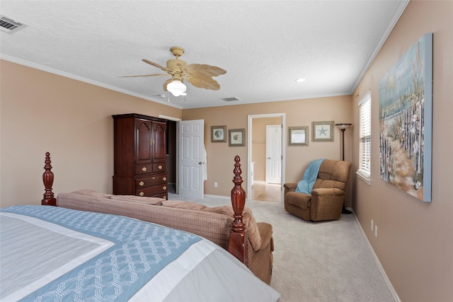 carpeted bedroom with crown molding, a textured ceiling, and ceiling fan