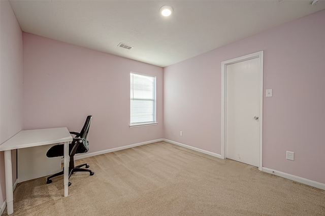 unfurnished office with light colored carpet