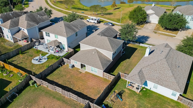 drone / aerial view with a water view