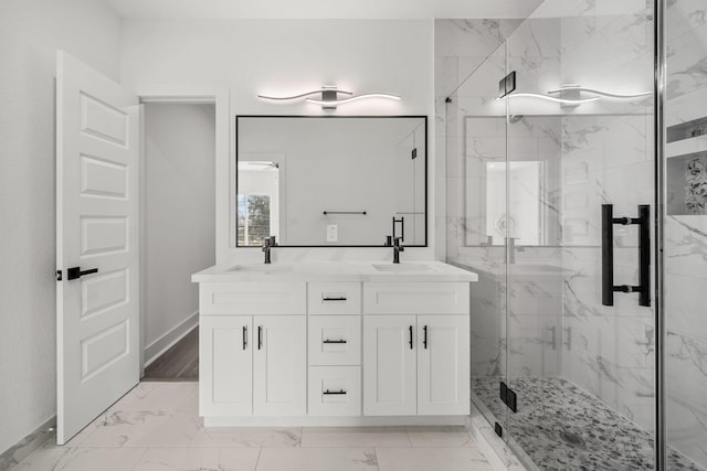 bathroom with vanity and an enclosed shower