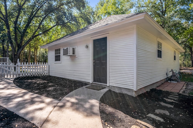 exterior space with an AC wall unit