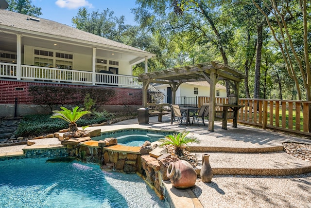 view of pool featuring a pergola, a patio area, and an in ground hot tub