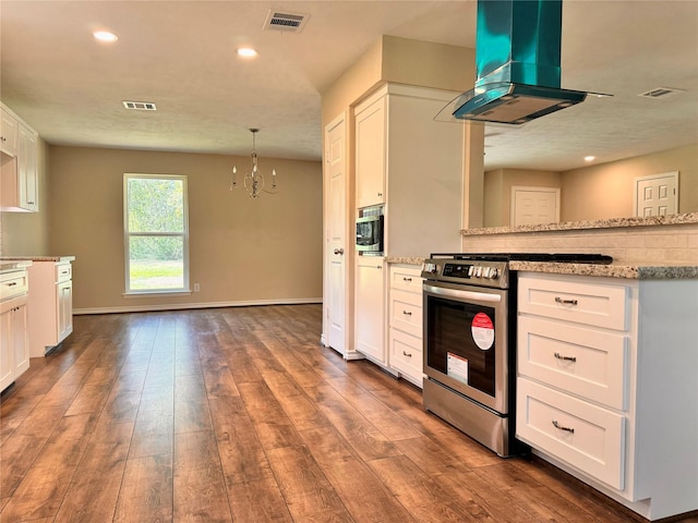 kitchen featuring an inviting chandelier, dark hardwood / wood-style flooring, ventilation hood, white cabinets, and appliances with stainless steel finishes