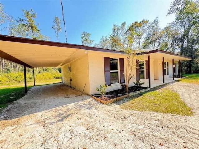 view of front of house with a carport