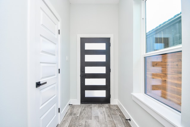 foyer with light hardwood / wood-style flooring