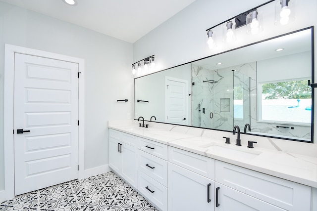 bathroom featuring vanity, tile patterned floors, and walk in shower