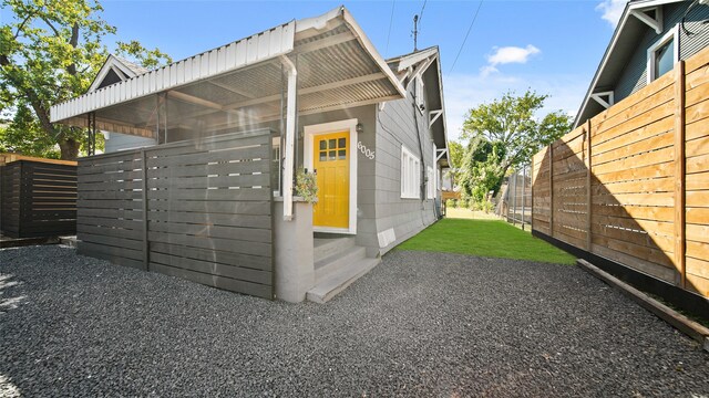 view of home's exterior with a patio area