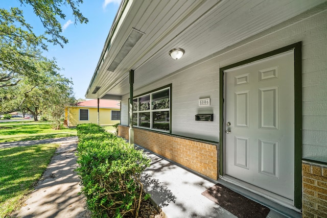 property entrance with a porch