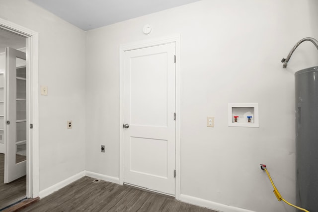 laundry area with dark wood-type flooring, hookup for a washing machine, and water heater