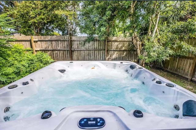 view of yard featuring a hot tub