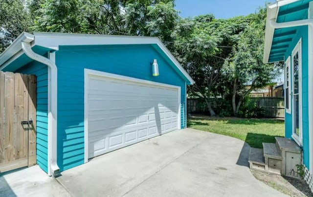 garage with a yard