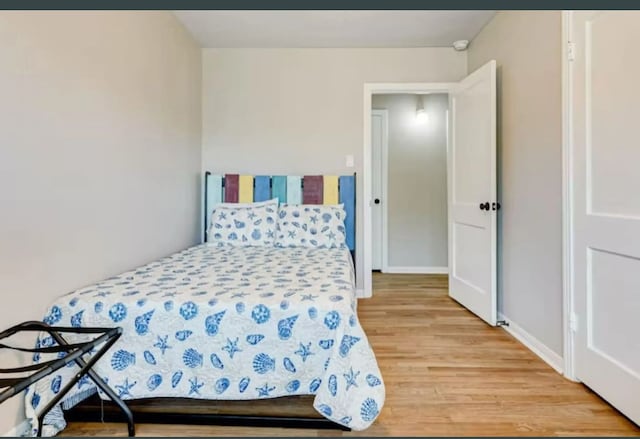 bedroom featuring light hardwood / wood-style flooring