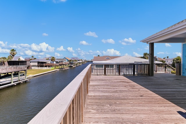 dock area with a water view