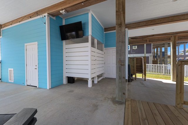 interior space featuring wooden walls