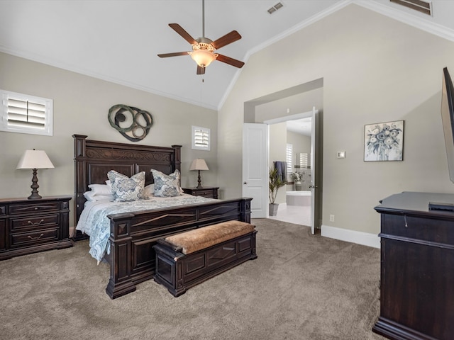 carpeted bedroom featuring ensuite bath, ceiling fan, lofted ceiling, and ornamental molding