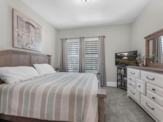 bedroom featuring light carpet