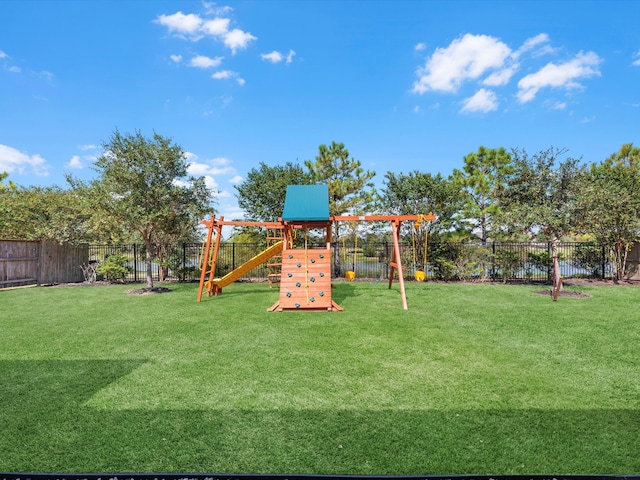 view of play area with a yard