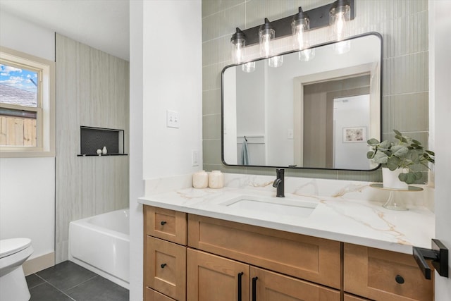 bathroom with tile patterned floors, vanity, and toilet