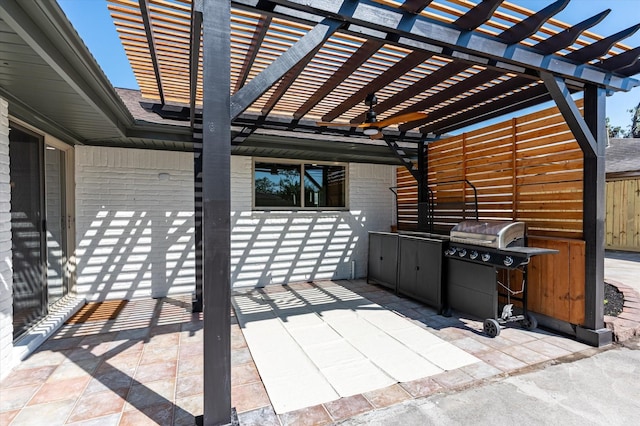 view of patio featuring a pergola and grilling area