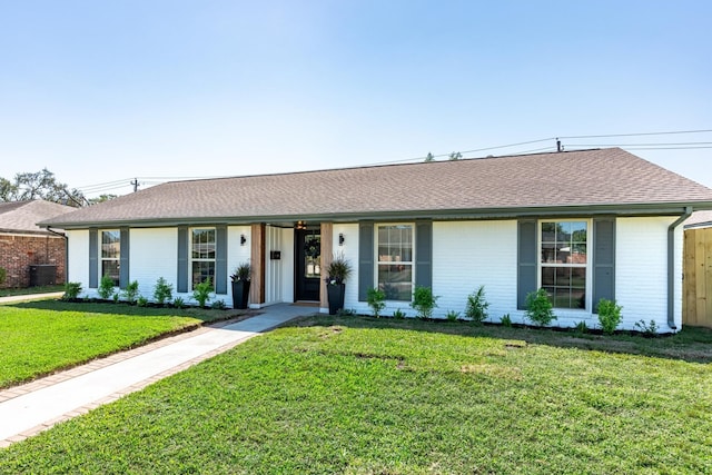 ranch-style home with a front yard