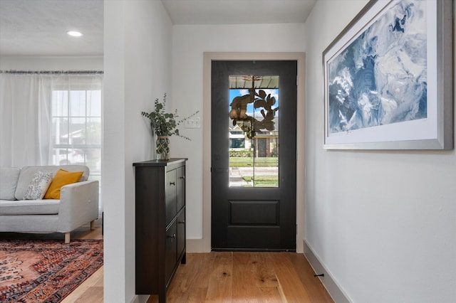 foyer featuring light wood-type flooring