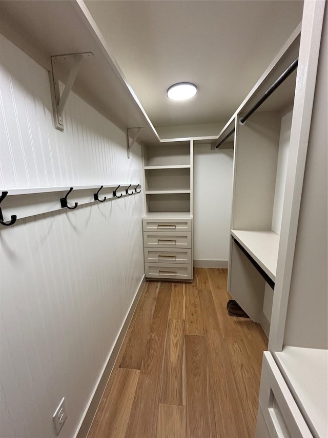 walk in closet featuring light wood-type flooring