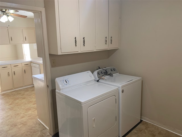 laundry room featuring ceiling fan, cabinets, and washing machine and clothes dryer